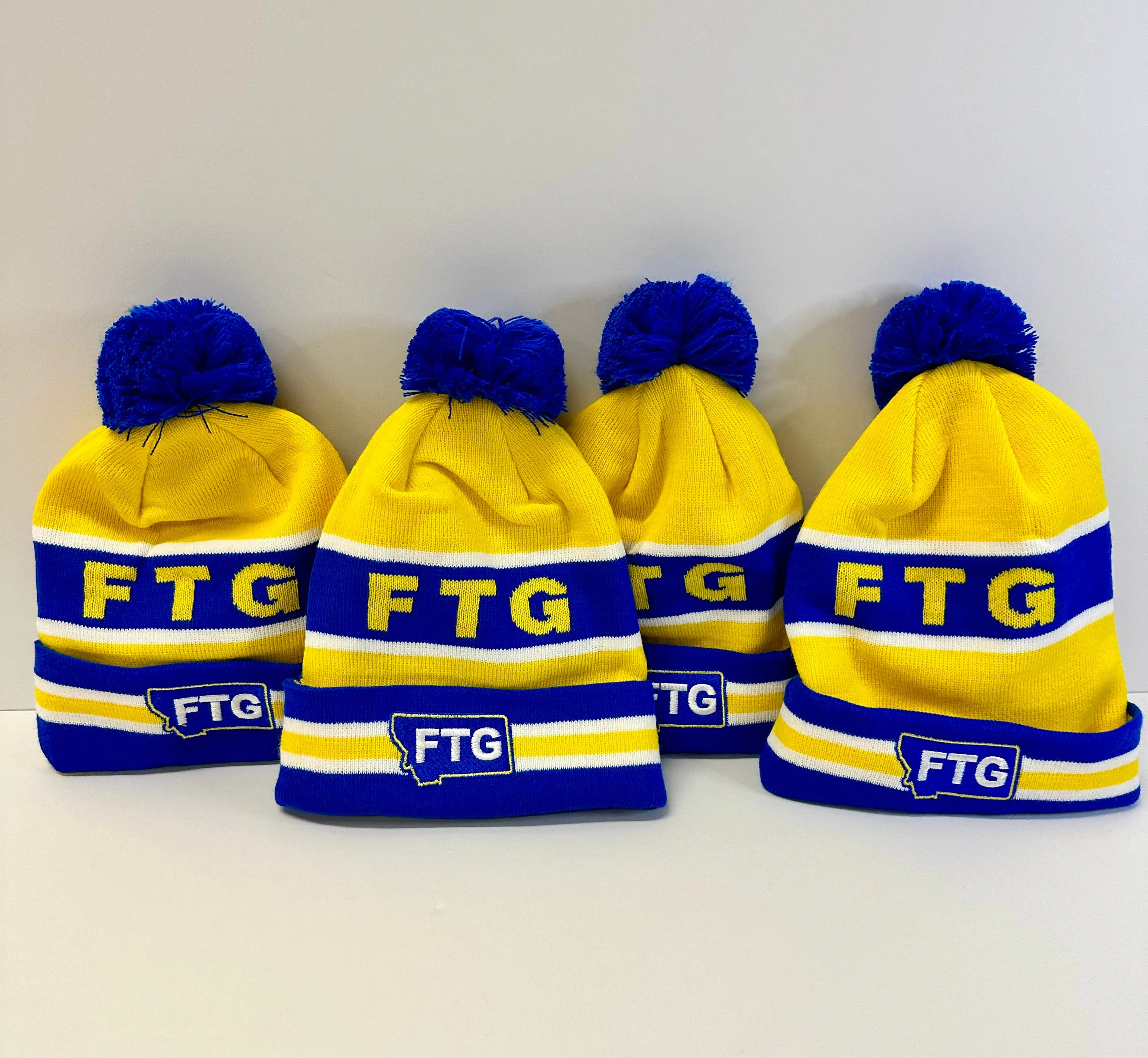 Brawl of the Wild Gold FTG Pom Beanie